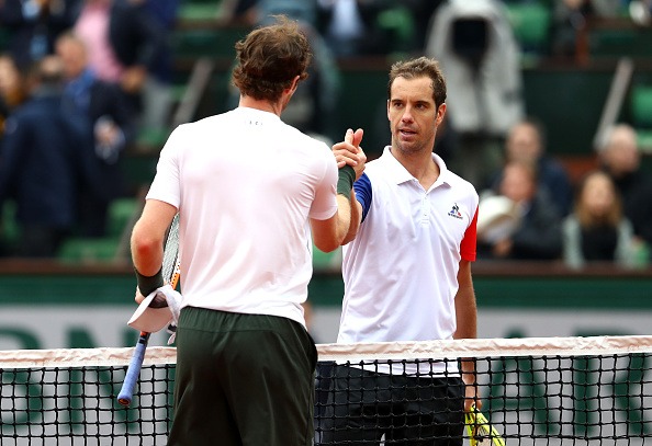 Richard Gasquet shaking hands with Andy Murray after making the quarterfinals of Roland Garros (Photo: Julian Finney/Getty Images)