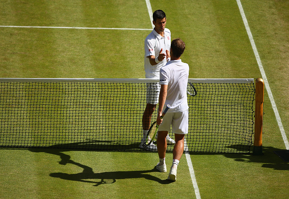 Richard Gasquet shaking hands with Novak Djokovic after losing out in the semifinals (Photo: Ian Walton/Getty Images)