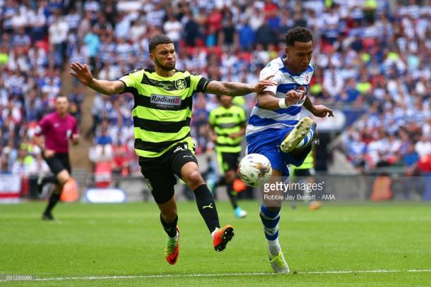 Wells (left) in the play-off final in May. | Photo: Getty/Robbie Jay Barratt - AMA.