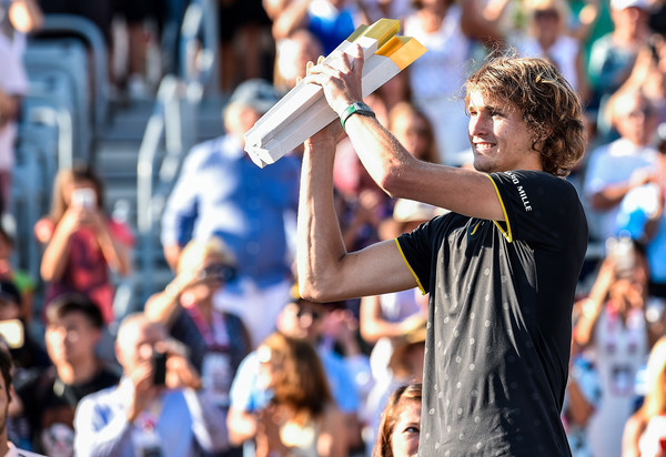 Photo Source: Minas Panagiotakis/Getty Images-Alexander Zverev hoists the Coupe Rogers trophy.