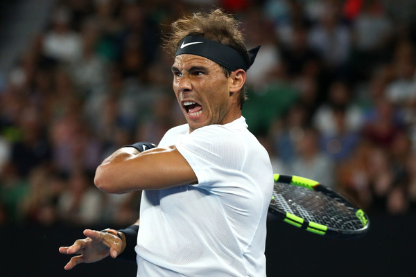 Nadal fires a forehand (Photo by Cameron Spencer/Getty Images)