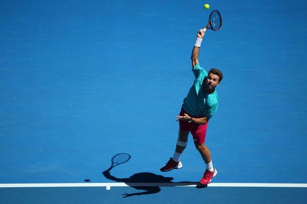Wawrinka serves in his quarterfinal match (Photo by Michael Dodge/Getty Images)