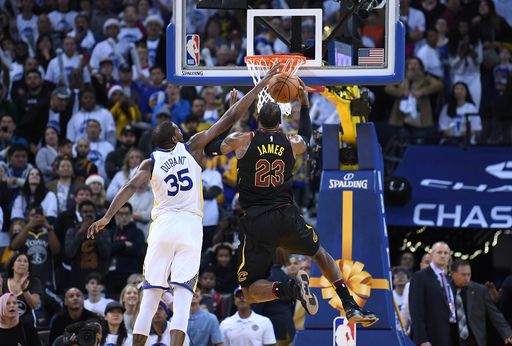 Durant makes the game-clinching block on James in the final seconds of the game/Photo: Thearon W. Henderson/Getty Images