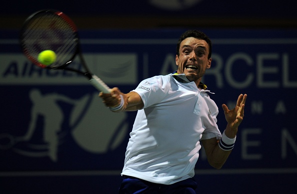 Roberto Bautista Agut hit a forehand (Photo: Arun Sankar/Getty Images)