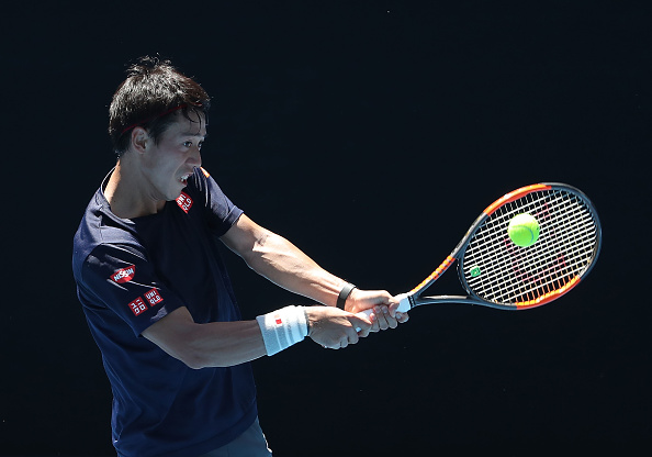 Kei Nishikroi working on his backhand (Photo: Scott Barbour/Getty Images)