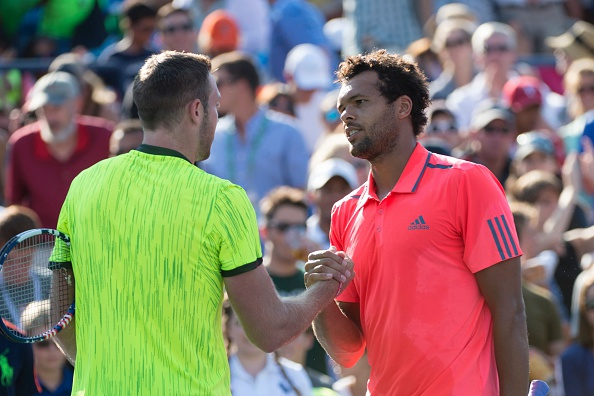 Jo-Wilfried Tsonga shakes hands with Jack Sock in their last meeting at the US Open in 2016 