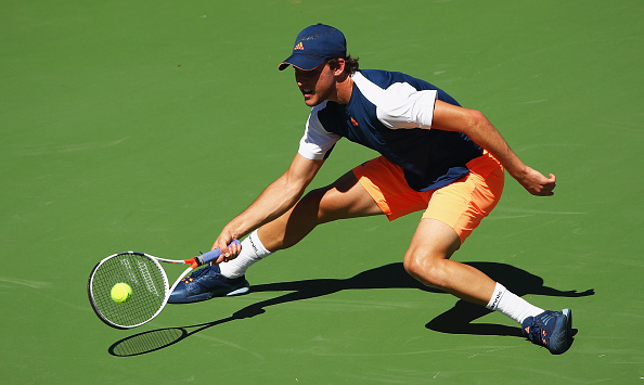 Dominic Thiem reaches for a shot (Photo: Clive Brunskill/Getty Images)