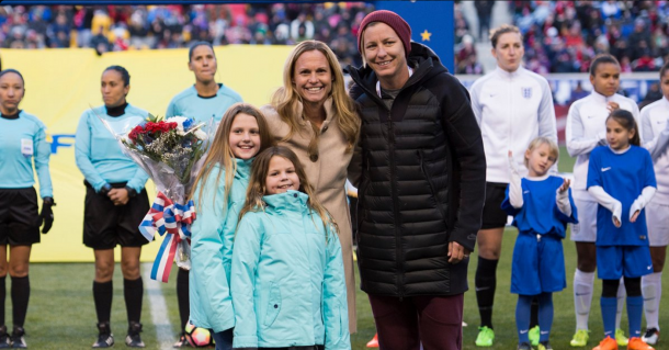 Christie Rampone at her SheBelieves Cup tribute along with her daughters and Abby Wambach. (Source: Sky Blue's twitter @SkyBlueFC)