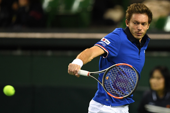 Nicolas Mahut strikes a backhand shot (Photo: Atsushi Tomura/Getty Images)