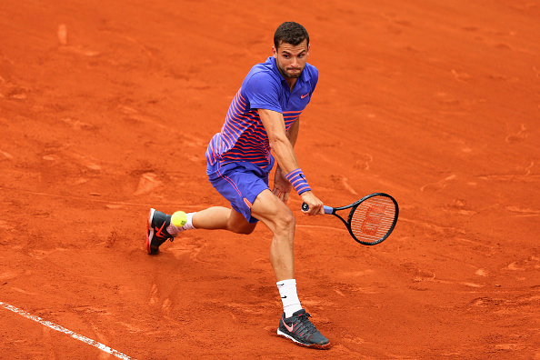 Grigor Dimitrov hitting a backhand shot (Photo: Clive Mason/Getty Images)