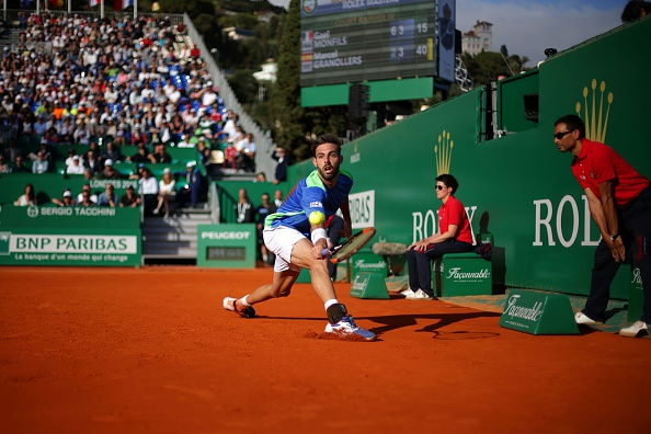 Marcel Granollers stretches for a shot (Photo: Jean Christophe Magnenet/Getty Images)