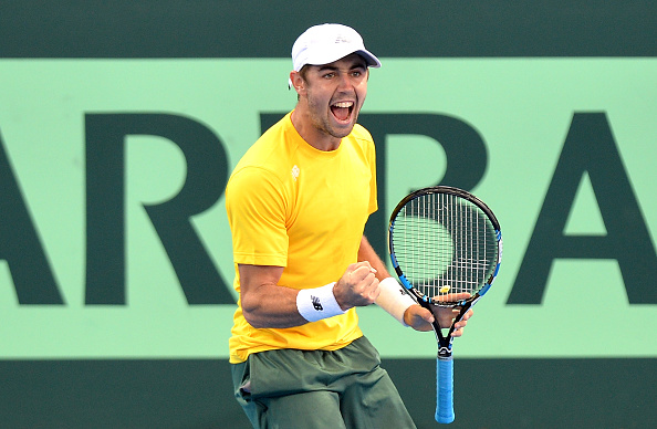 Jordan Thompson celebrates helping Australia win their first point (Photo: Bradley Kanaris/Getty Images(