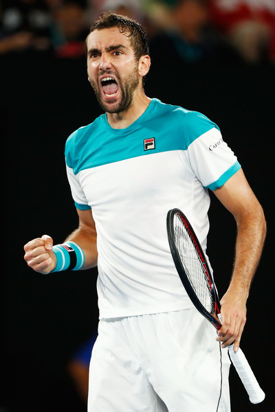 Marin Cilic celebrates after winning the second set against Roger Federer during the 2018 Australian Open final. | Photo: Michael Dodge/Getty Images