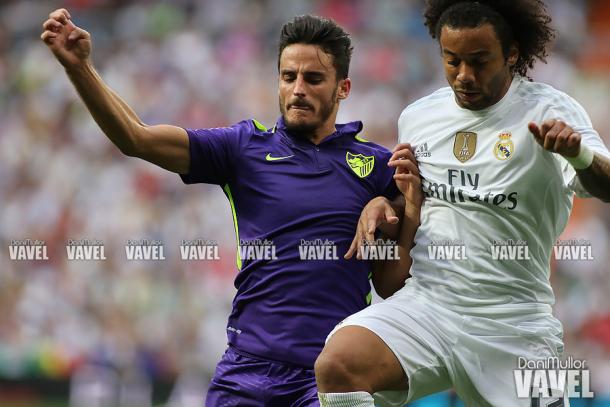 Juankar pugna por el balón con Marcelo durante un partido esta temporada | Foto: Dani Mullor (VAVEL)