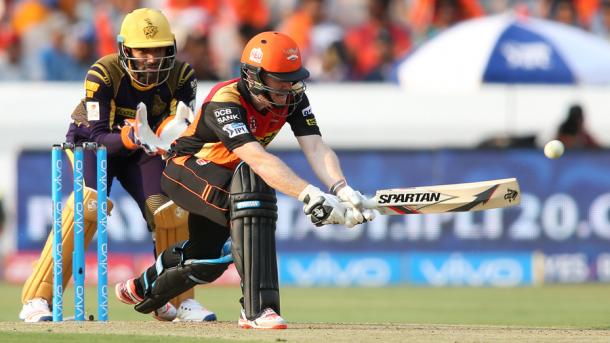 Morgan playing a reverse sweep during his half century | Photo: BCCI
