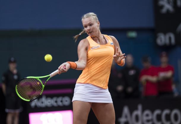 Kiki Bertens hits a forehand in Fed Cup competition days ago | Photo: Henk Koster/Fed Cup