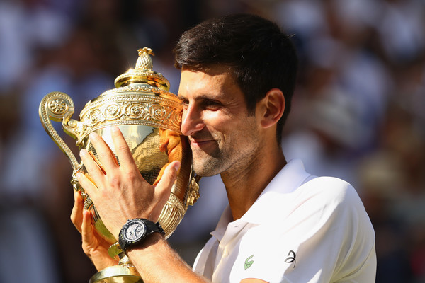 Novak Djokovic poses with the Wimbledon trophy last month. Photo: Michael Steele/Getty Images