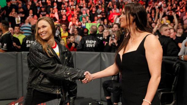 Stephanie McMahon was hesitant to accept the hand of the woman who nearly put her in an armbar.   Photo credit: WWE