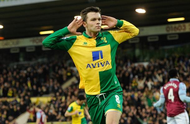 Jonny Howson celebrates scoring against Aston Villa | Credit: Joe Toth/BPI