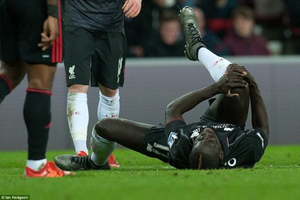 Mamadou Sakho was both unimpressed and in sufficient pain after Jeremain Lens' challenge.