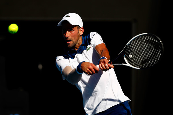 Novak Djokovic hits a backhand during his return in Melbourne. Photo: Michael Dodge/Getty Images