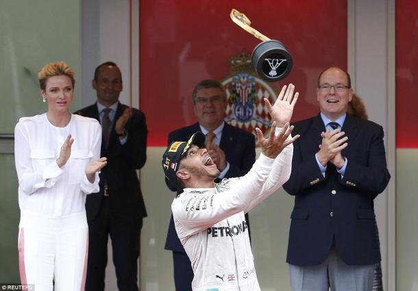 Hamilton celebrates a splendid win. (Photo: Reuters)