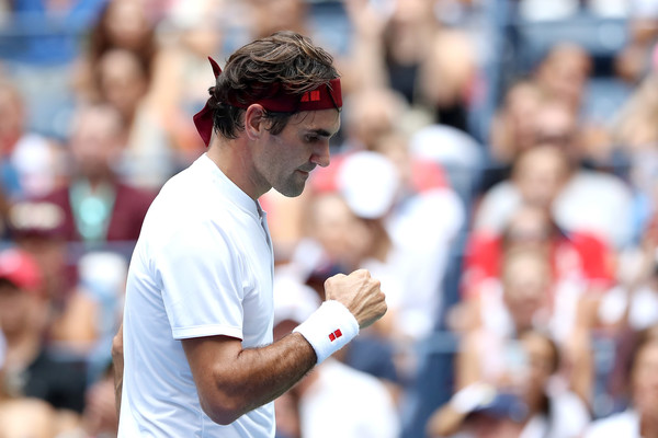 Roger Federer pumps his fist during one of his routine early wins. Photo: Elsa/Getty Images