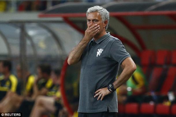 Above: Jose Mourinho watching his Manchester United side defeated 4-1 by Borussia Dortmund | Photo: Reuters