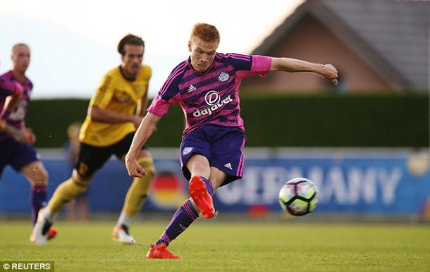 Above: Sunderland's Duncan Watmore strikes home in their 2-0 win over 