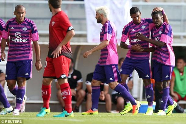 Joel Asoro (right) is congratulated by teammates after scoring against Dijon. (Photo: Reuters)