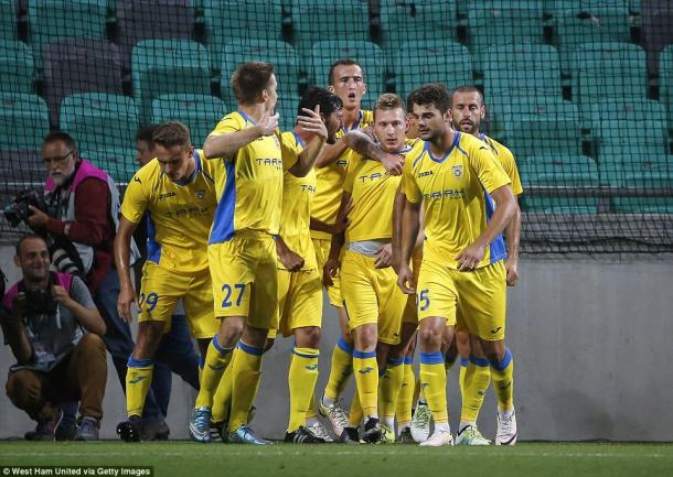 Above: A collection of NK Domazle players celebrating in their 2-1 win over West Ham United | Photo: West Ham United via Getty Images 