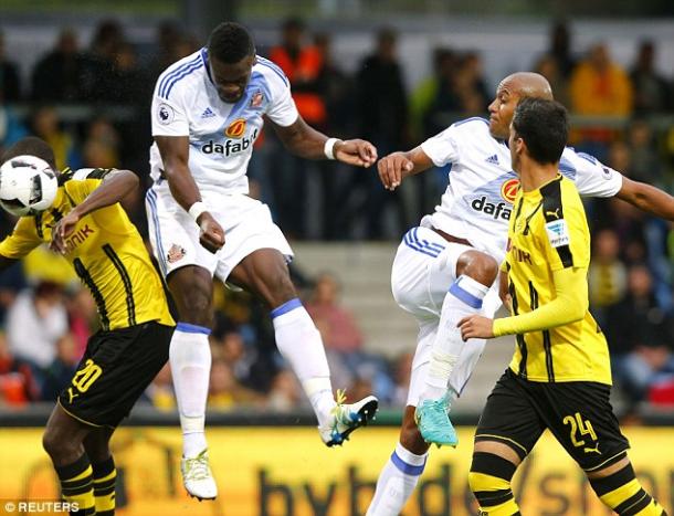 Above: Lamine Kone heading home the equaliser in Sunderland's 1-1 draw with Borussia Dortmund | Photo: Reuters