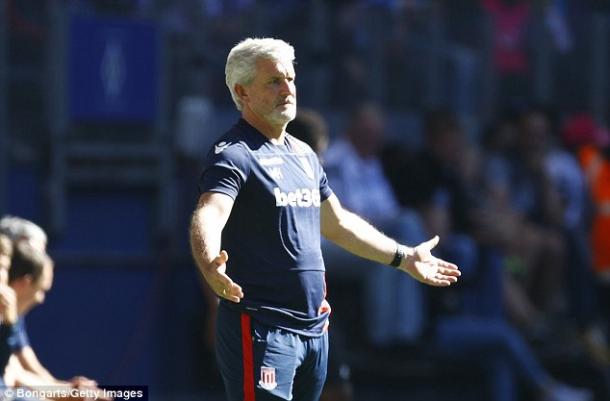 Above: Mark Hughes on the Stoke City touchline | Photo: Bongarts/Getty Images