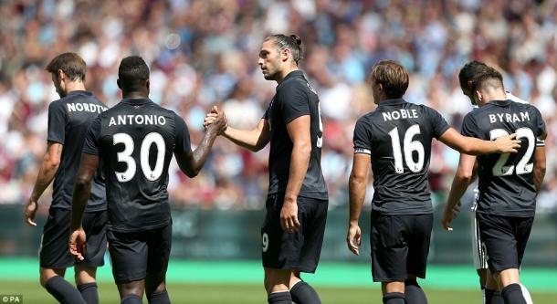 Andy Carroll celebrating his goal in West Ham's 3-2 defeat to Juventus. | Photo: PA