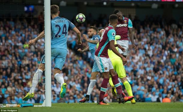 Above: Michail Antonio heading home in West Ham's 3-1 defeat to Manchester City | Photo: Ian Hodgson 