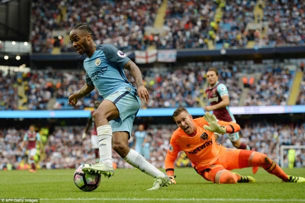 Above: Raheem Sterling roudning Adrian for his second goal in Manchester City's 3-1 win over West Ham | Photo: AFP/Getty Images