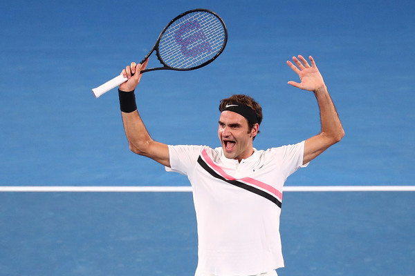 Roger Federer celebrates winning his sixth Australian Open. Photo: Chris Hyde/Getty Images