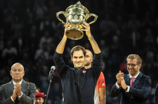 Roger Federer hoists another trophy in his hometown of Basel. Photo: TF Images/Getty Images