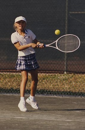 In contrast to the many wealthy kids who trained at the Nick Bollettieri Tennis Academy, Sharapova said she appeared at the academy “with a single change of clothes, an oversized chopped-down racket, and shoes from a factory in Minsk.” | Photo from “Unstoppable: My Life So Far,” courtesy of Maria Sharapova