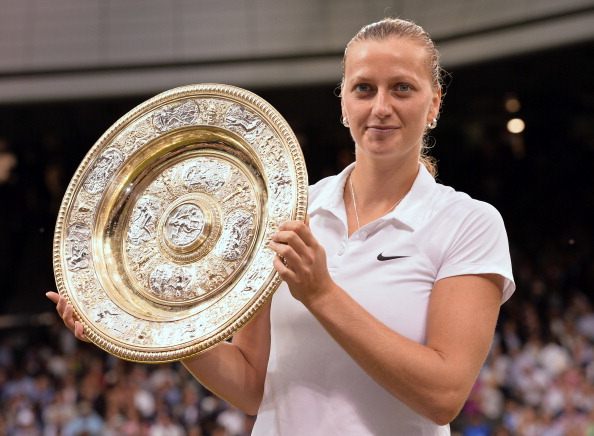 Kvitova graces with the Venus Rosewater Dish after winning the Wimbledon Championships in 2014, her second and most recent Grand Slam crown. Photo credit: Karwai Tang/Getty Images,