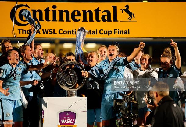 City celebrate winneing their first silverware in 2014