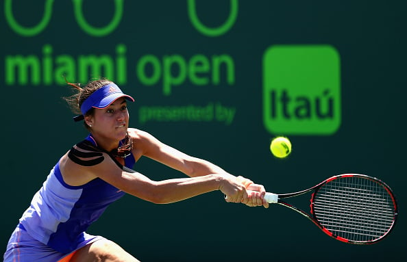 Sorana Cirstea of Romania plays a backhand to Christina McHale of the United States in their first round match during the Miami Open at Crandon Park Tennis Center on March 25, 2015 in Key Biscayne, Florida. (Photo by Clive Brunskill/Getty Images)