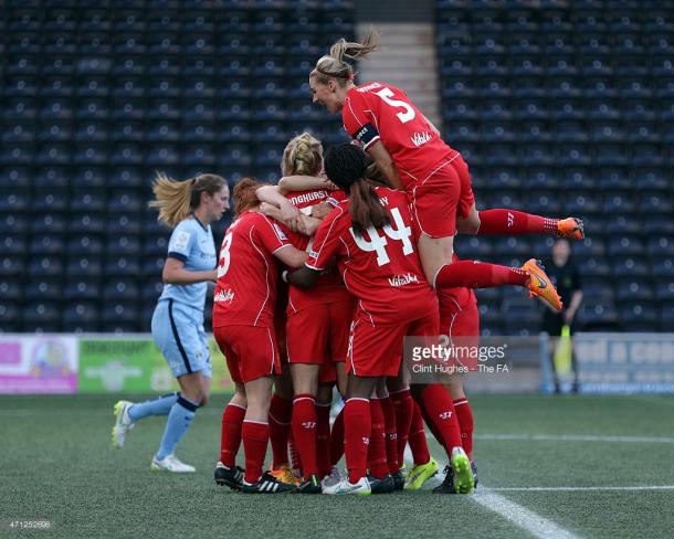 April 2015, the last time City were beaten in the league. Liverpool players celebrate Line Smorsgard's winner