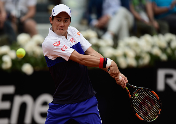 Kei Nishikori strikes a backhand at the Internazionali BNL D'Italia in Rome/Getty Images