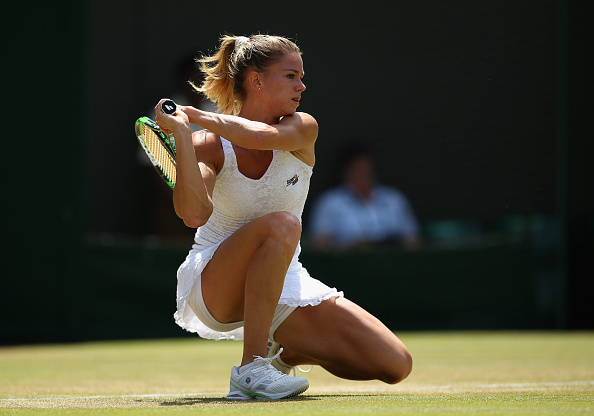 Camila Giorgi returns a shot in her match against Caroline Wozniacki at the Wimbledon Lawn Tennis Championships. (Photo by Ian Walton/Getty Images)