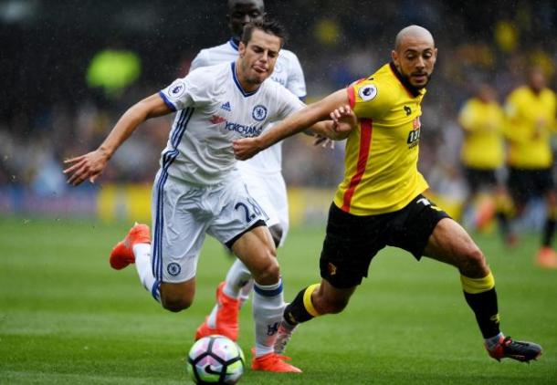 Nordin Amrabat holds off Cesar Azpilicueta on Saturday (Photo: Action Images)