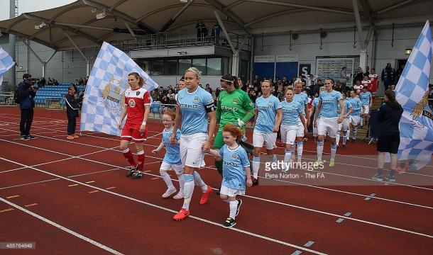 Houghton leads MCWFC out for their first ever WSL home game