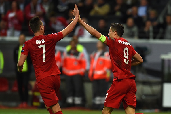 Milik and Lewandowski | Photo: Patrik Stollarz/AFP/Getty Images