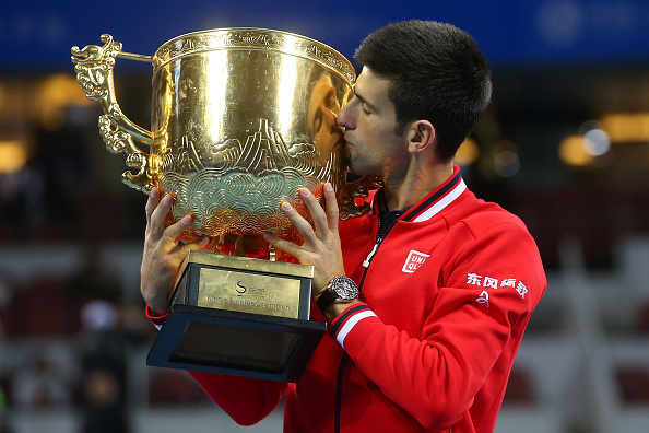 Novak Djokovic with the 2015 China Open trophy in Beijing/Getty Images