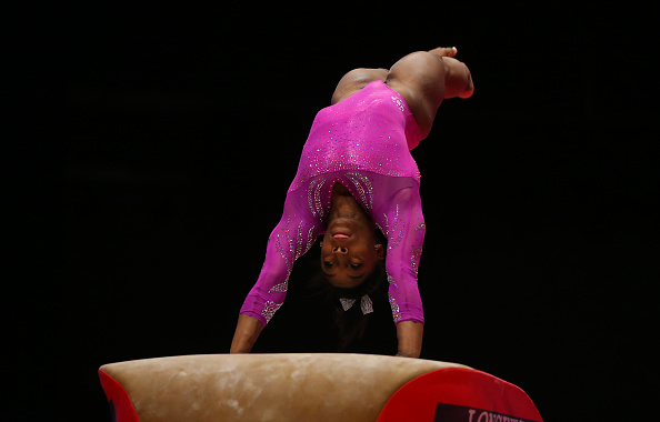 Simone Biles performs on vault at the 2015 World Artistic Gymnastic Championships in Glasgow/Getty Images